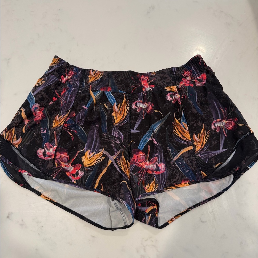 Lululemon Hotty Hot shorts in the "Veiled Floral Black Multi" 4” size 12